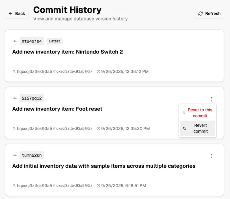 v0.app: Dolt revert action in commit history page